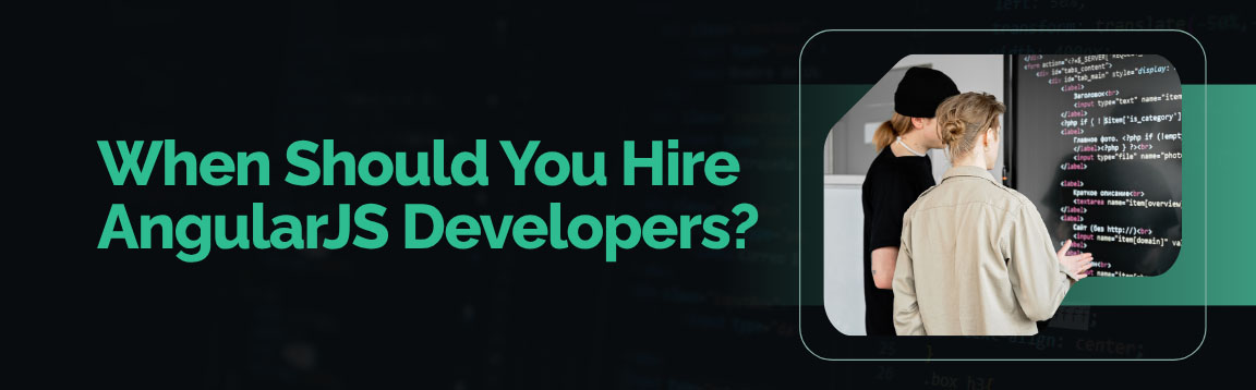 When Should You Hire AngularJS Developers? with a photo of two people looking at code on a large monitor.