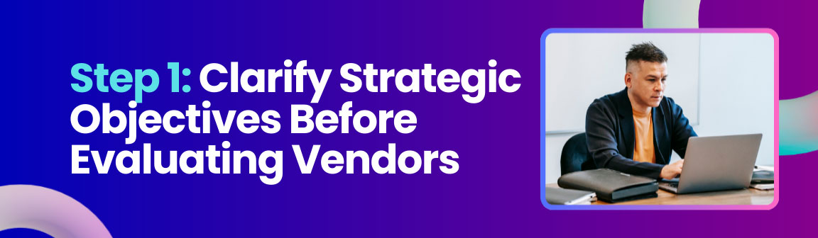 Step 1 clarifying strategic objectives before evaluating enterprise AI vendors with professional working on laptop